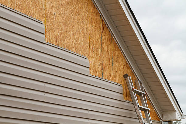 Professional Emergency Siding Repair technician working in Central Islip, NY